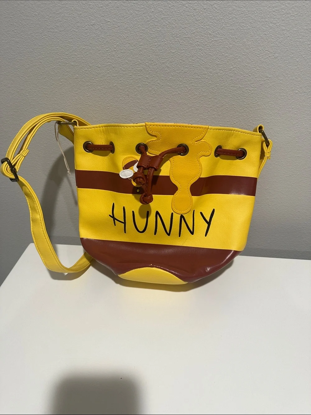 Loungefly Yellow and Brown 'HUNNY' Drawstring Crossbody Bag